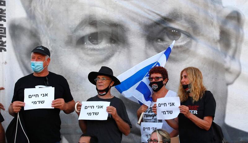 Protesters gather in Tel Aviv's Rabin Square on June 6, 2020, to denounce Israel's plan to annex parts of the occupied West Bank amid Israeli Prime Minister Benjamin Netanyahu's  pledge to forge ahead with the illegal move. AFP