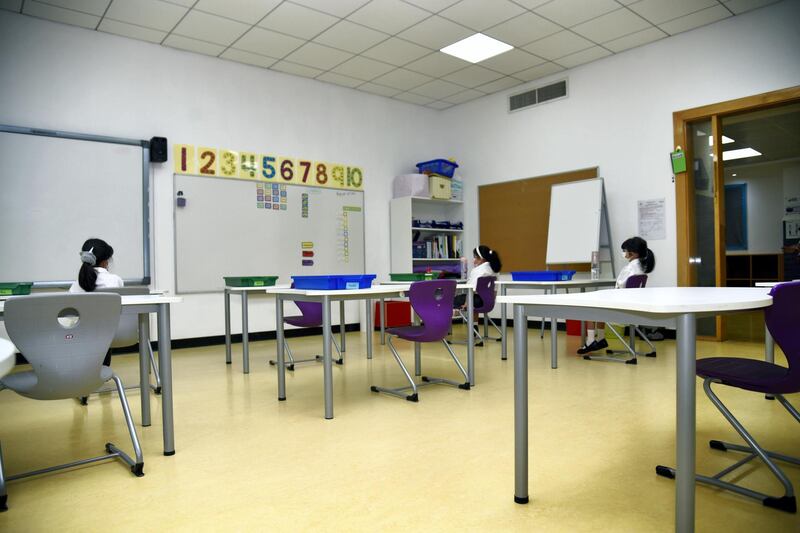 Students sit spaced apart in their classroom at the Al-Mizhar American Academy after the government re-opens schools in the wake of the Covid-19 pandemic, in Dubai, UAE, Sunday, Aug. 30, 2020. (Photos by Shruti Jain - The National)