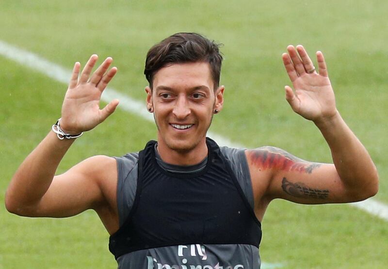 Arsenal's Mesut Ozil of Germany attends a training session in Singapore July 25, 2018.  REUTERS/Edgar Su