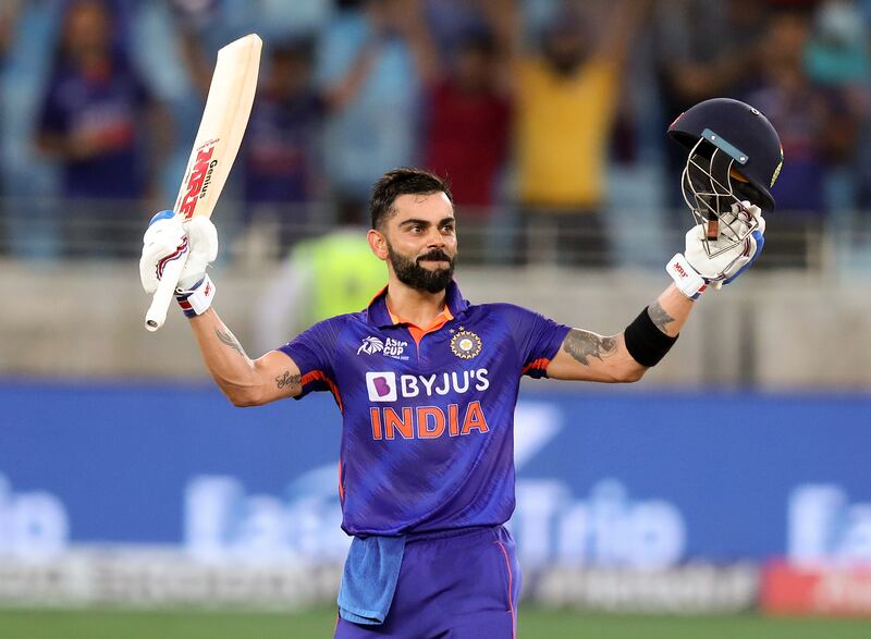 Virat Kohli celebrates his ton. Chris Whiteoak / The National