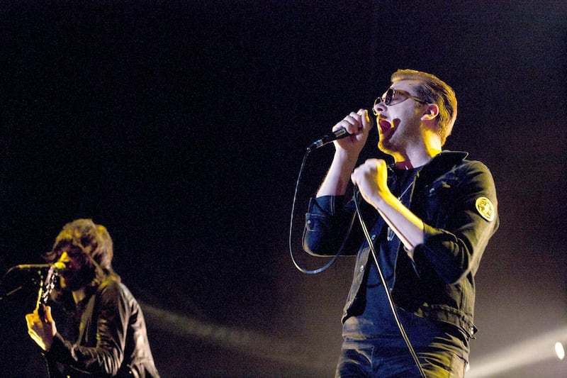 Sergio Pizzorno, left, and Tom Meighan, of the band Kasabian in concert at Dubai rugby Sevens grounds in 2012. Duncan Chard for the National