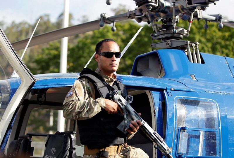 Police official Oscar Perez poses for photographs during an event of the Body of Scientific, Penal and Criminal Investigation (CICPC) in Caracas, Venezuela on March 1, 2015. Christian Veron / Reuters