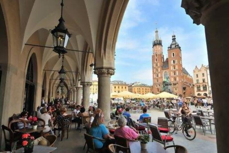 Main market with cloth hall and Church of our Lady, Krakow, Poland, Europe (Getty Images)