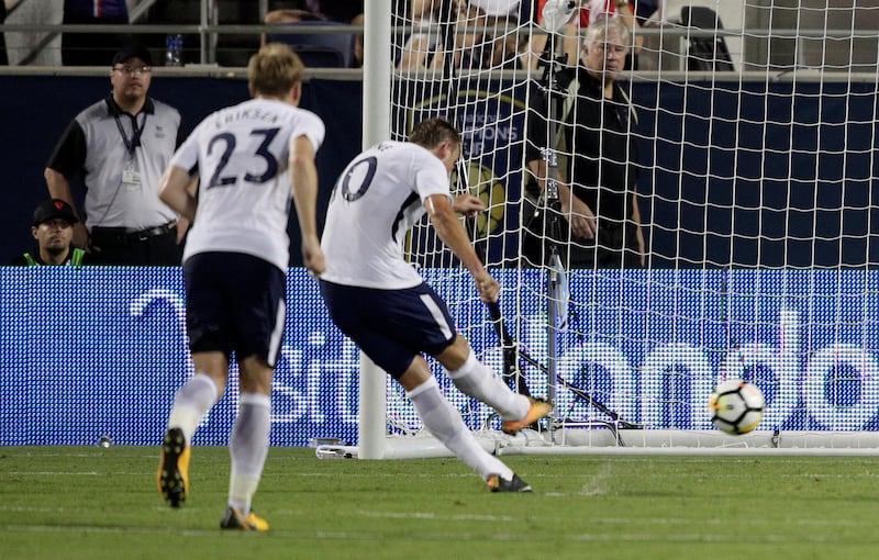 Tottenham Hotspur striker Harry Kane scores from the spot against Paris Saint-Germain at Orlando. Kevin Kolczynski / Reuters