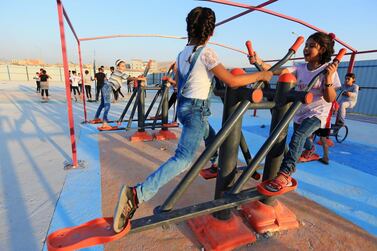 Displaced Iraqi children from the minority Yazidi community, who fled the Iraqi town of Sinjar, play at Sharya camp on the outskirts of Duhok governorate, in northern Iraq. Reuters.
