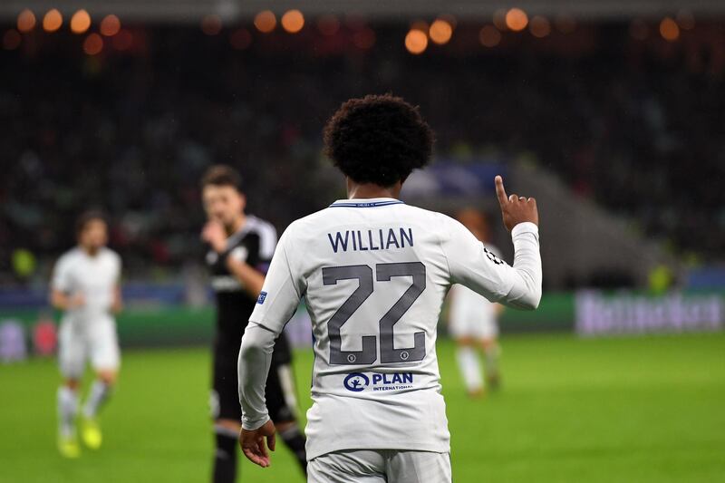 Willian celebrates scoring his second goal. Kirill Kudryavtsev / AFP