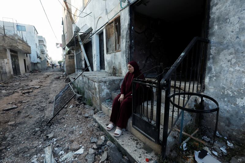 A Palestinian woman surveys the damage after the Israeli army's withdrawal from Jenin. Reuters