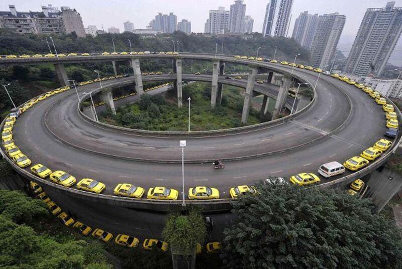 Taxis line up to get their tanks filled in Chongqing, China.