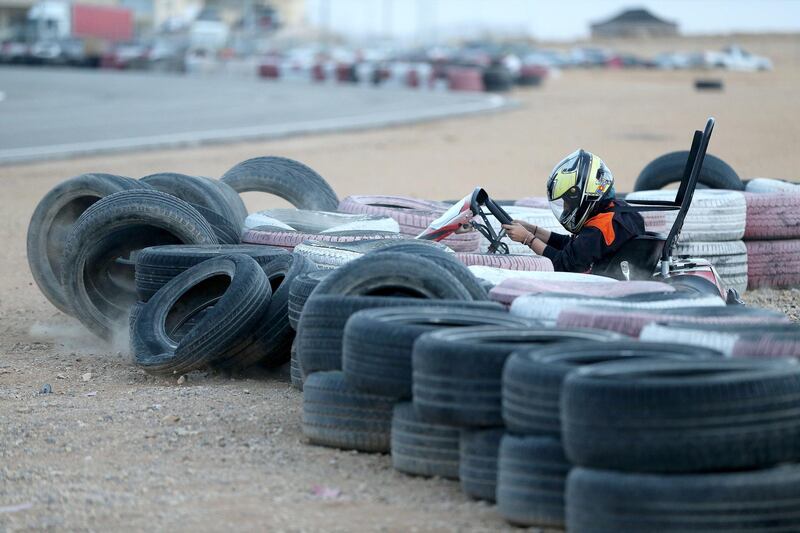 A female kart race driver hits the barrier during a race in Riyadh, Saudi Arabia. EPA