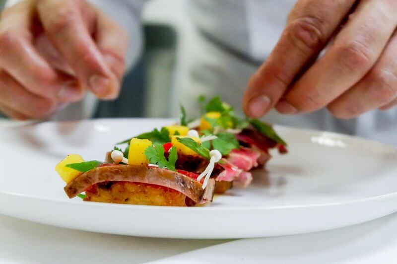 Beef tataki with crispy rice; Dh80