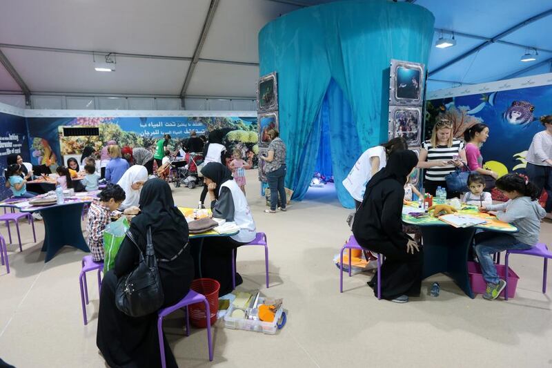 Children and parents explore the marine life section at the Abu Dhabi Science Festival. Christopher Pike / The National