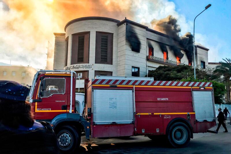 At least one person was killed on December 25 as attackers stormed Libya's foreign ministry after a car bomb exploded in front of the building and a suicide bomber then struck inside, a security source said. AFP