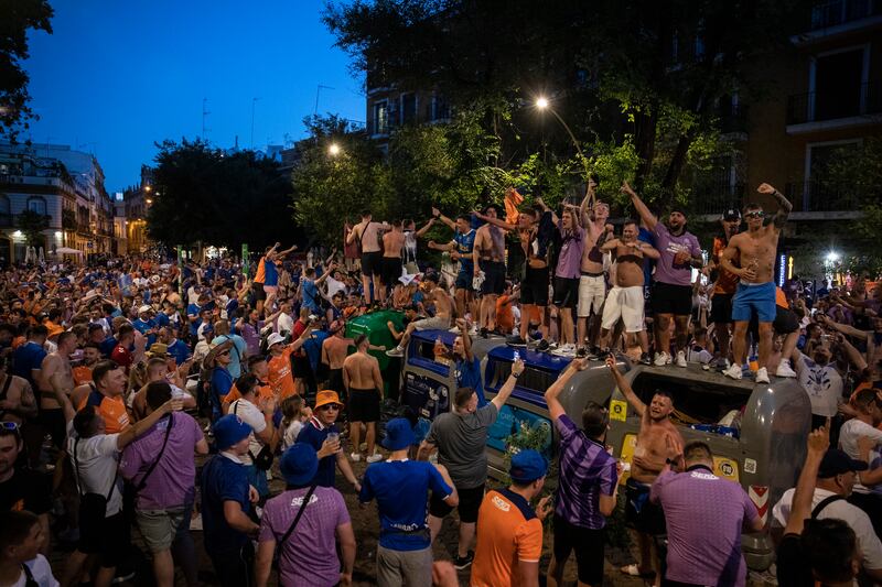 Rangers fans enjoy the atmosphere in Seville. Getty