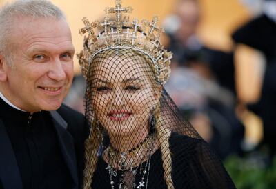Designer Jean Paul Gaultier and Madonna arrive at the Metropolitan Museum of Art Costume Institute Gala (Met Gala) to celebrate the opening of “Heavenly Bodies: Fashion and the Catholic Imagination” in the Manhattan borough of New York, U.S., May 7, 2018. REUTERS/Eduardo Munoz