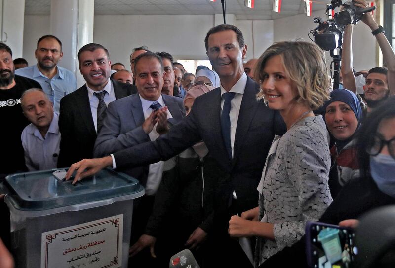 Syrian President Bashar Al Assad and his wife Asma cast their votes in Douma, near Damascus. Syria held presidential elections on May 26 after allowing its citizens around the world to vote the week prior at  embassies. AFP