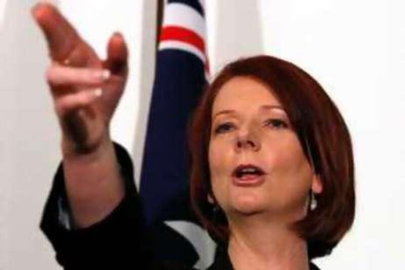 CANBERRA, AUSTRALIA - JUNE 24:  Australian Prime Minister Julia Gillard gestures during a press conference following the Labour leadship spill which saw Gillard call a leadership ballot for the role of Prime Minister at Parliament House on June 24, 2010 in Canberra, Australia. Gillard demanded the ballot as party support for current PM Kevin Rudd collapsed. However no votes were cast in the caucus held this morning at 09:00 AEST, as Rudd conceded and stood down, making Gillard Australia's first female Prime Minister, with current treasurer Wayne Swan moving into the role of Deputy.  (Photo by Scott Barbour/Getty Images) *** Local Caption ***  GYI0060851635.jpg