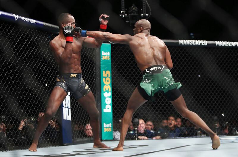 Kamaru Usman lands a punch on Leon Edward during their welterweight title bout at UFC 286. PA