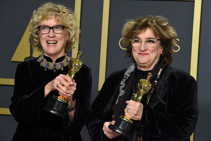 Nancy Haigh, left, and Barbara Ling, winners of the award for best production design for "Once Upon a Time in Hollywood". AP