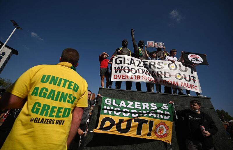 Supporters protest against Manchester United's owners outside Old Trafford stadium. AFP