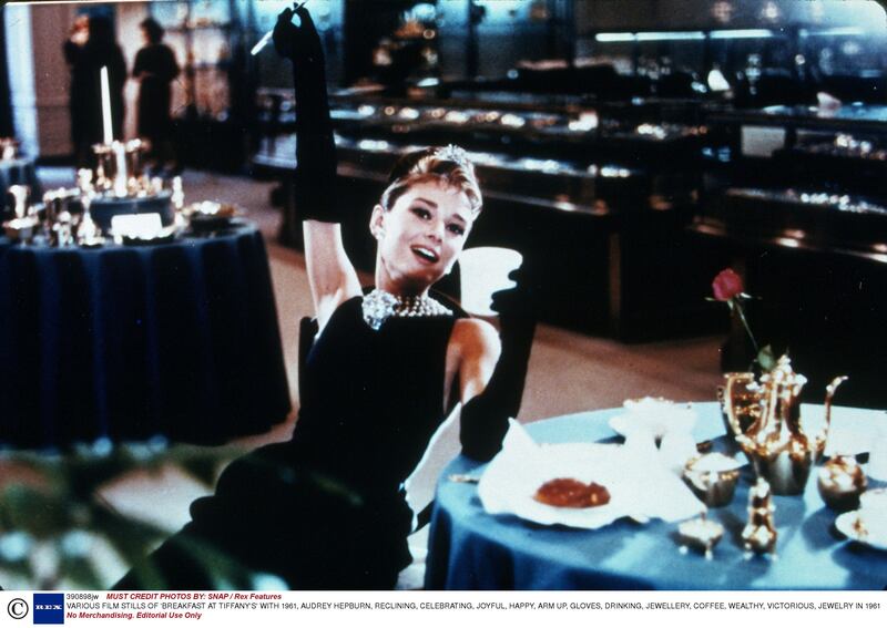 No Merchandising. Editorial Use Only
Manadatory Credit: Photo by SNAP / Rex Features (390898jw)
FILM STILLS OF 'BREAKFAST AT TIFFANY'S' WITH 1961, AUDREY HEPBURN, RECLINING, CELEBRATING, JOYFUL, HAPPY, ARM UP, GLOVES, DRINKING, JEWELLERY, COFFEE, WEALTHY, VICTORIOUS, JEWELRY IN 1961
VARIOUS

