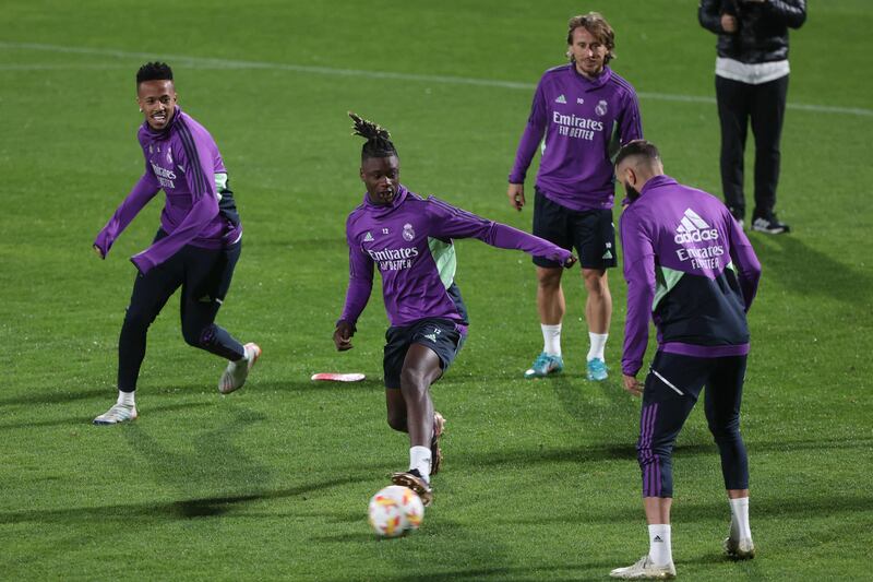 Real Madrid's Brazilian defender Eder Militao, French midfielder Eduardo Camavinga, and Croatian midfielder Luka Modric in action. AFP