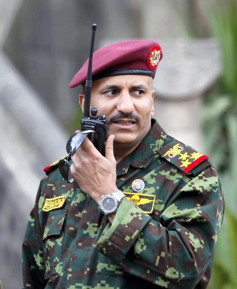 General Tariq Saleh, a nephew of former Yemeni leader Ali Abdullah Saleh, speaks on his walkie-talkie at the Republican Palace in Sanaa January 10, 2011. Tariq has resigned from his post as commander of an elite military unit, officials said on May 3, 2012, part of a drive by the country's new U.S.-allied government to unite its army in order to fight al Qaeda. U.N. envoy Jamal Benomar told Reuters that Tariq Saleh, who earlier headed the Presidential Guard, had relinquished his new post as head of the 3rd Republican Guard brigade. Picture taken January 10, 2011. REUTERS/Khaled Abdullah (YEMEN - Tags: POLITICS CIVIL UNREST MILITARY) - GM1E8540DT401