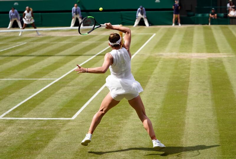 Simona Halep returns a shot. EPA