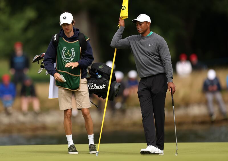 Tiger Woods looks on at the 8th green. Getty Images