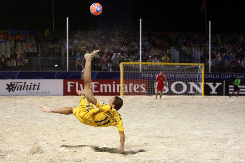 Ukraine's Oleksandr Korniichuk delivers a wheel kick during their Beach Soccer World Cup match between Ukraine and Brazil at Papeete, Tahiti. Gregory Boissy / AFP