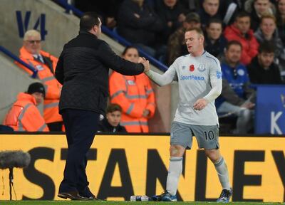 LEICESTER, ENGLAND - OCTOBER 29:  Wayne Rooney of Everton shakes hands with David Unsworth, Caretaker Manager of Everton as he is substituted during the Premier League match between Leicester City and Everton at The King Power Stadium on October 29, 2017 in Leicester, England.  (Photo by Michael Regan/Getty Images)