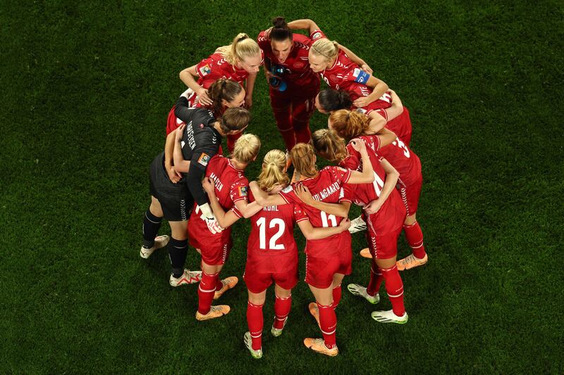 Denmark's players gather in a huddle before the game. AFP