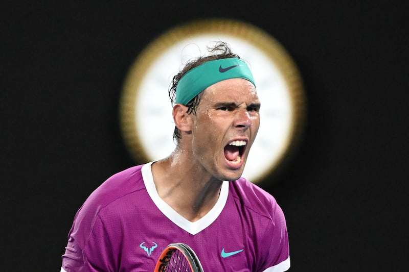 Rafael Nadal defeated Daniil Medvedev in a five-set epic at Melbourne Park for his record-breaking 21st Grand Slam title. EPA