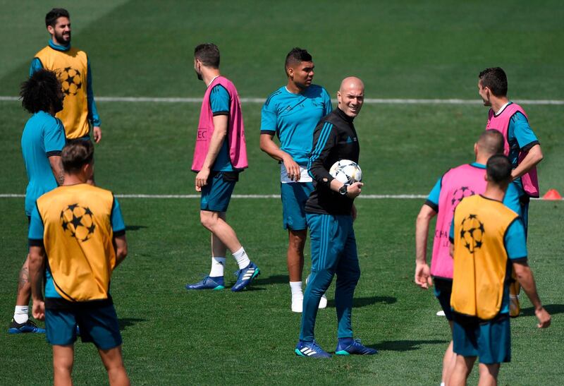 Real Madrid manager Zinedine Zidane oversees training ahead of the Uefa Champions League final. Gabriel Bouys / AFP