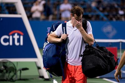 An emotional Andy Murray, of Britain, steps off the court after defeating Marius Copil, of Romania, 6-7(5), 3-6, 7-6(4), during the Citi Open tennis tournament in Washington, Friday, Aug. 3, 2018. (AP Photo/Andrew Harnik)