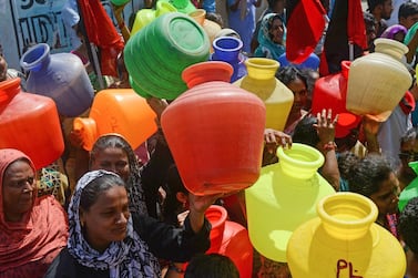 Women with empty plastic pots protest to demand drinking water in Chennai on June 22, 2019, as the south Indian city faces its worst water shortage in decades. AFP