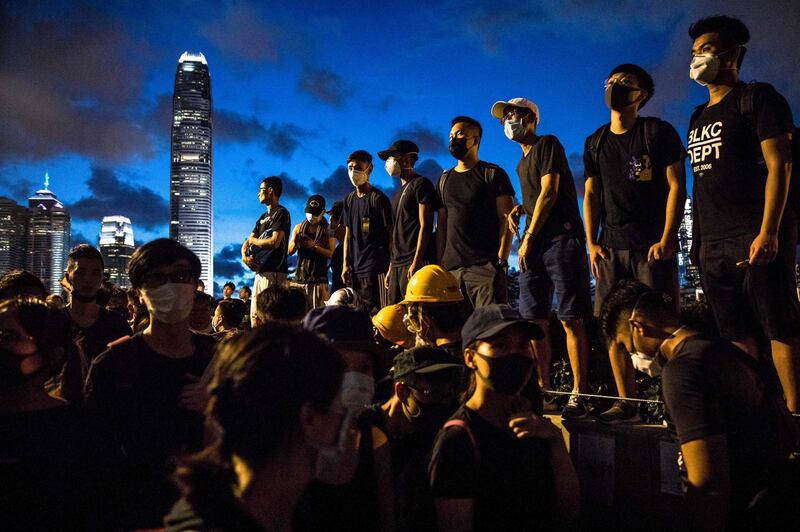 Protesters gather outside the government headquarters. AFP