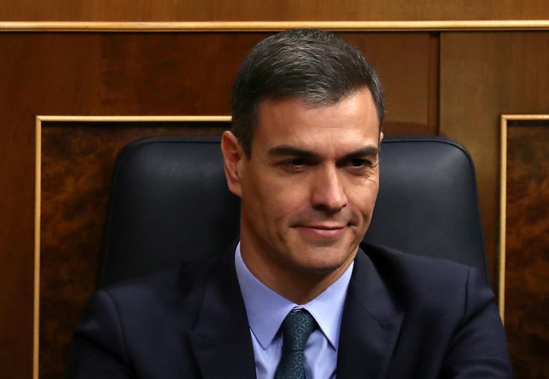 FILE PHOTO: Spain's Prime Minister Pedro Sanchez reacts during a session at Parliament in Madrid, Spain, February 13, 2019. REUTERS/Sergio Perez/File Photo