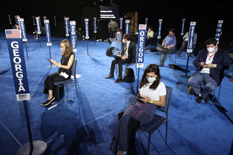 Members of the media wait for Democratic Vice Presidential nominee US Senator Kamala Harris to speak on the third night of the Democratic National Convention from the Chase Center in Wilmington, Delaware, USA.  AFP