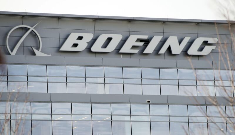 (FILES) This file photo taken on December 13, 2016 shows Boeing's Government Operations office building in Arlington, Virginia.
Aerospace giant Boeing raised concerns on September 5, 2017 about the merger of US-based industrial conglomerate United Technologies and aviation equipment supplier Rockwell Collins, saying it could use its weight with regulators to scrutinize the deal.Boeing said it was concerned the deal announced September 4, 2017 would not be in the best interests of the company."We intend to take a hard look at the proposed combination of United Technologies and Rockwell Collins," Boeing said in a statement.  
 / AFP PHOTO / SAUL LOEB