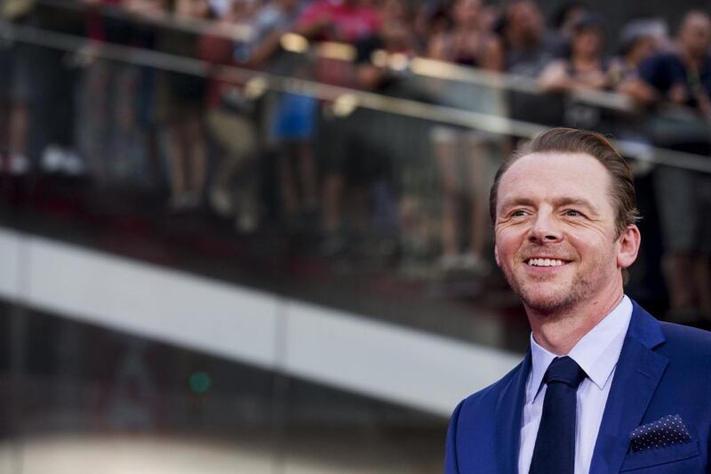 Actor Simon Pegg poses on the red carpet for a screening of the film Mission Impossible — Rogue Nation in New York . Brendan McDermid / Reuters