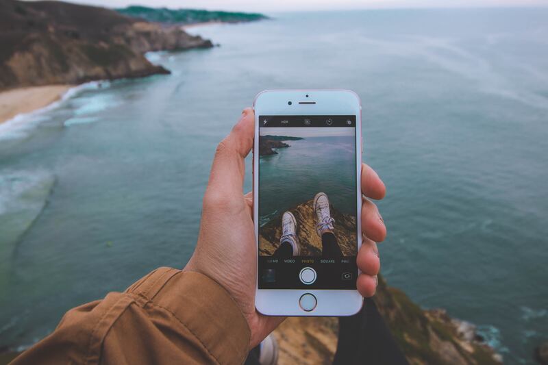 Half of UAE travellers struggle to disconnect from digital devices while on holiday. Photo: Nadine Shaabana / Unsplash