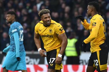 Wolverhampton Wanderers' Adama Traore, centre, celebrates after scoring his side's opening goal during the English Premier League soccer match between Wolverhampton Wanderers and Tottenham Hotspur at Molineux stadium in Wolverhampton, England, Saturday, March 4, 2023.  (AP Photo / Rui Vieira)