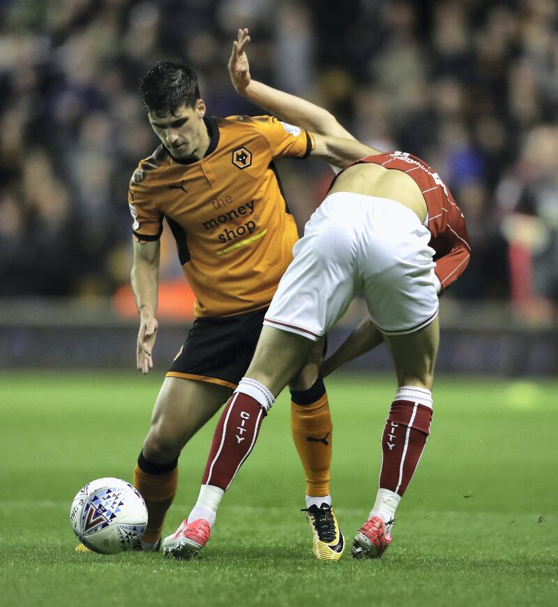 WOLVERHAMPTON, ENGLAND - SEPTEMBER 12:  Ruben Vinagre (L) of Wolverhampton Wanderers is challenged by Callum O'Dowda during the Sky Bet Championship match between Wolverhampton and Bristol City at Molineux on September 12, 2017 in Wolverhampton, England.  (Photo by David Rogers/Getty Images)