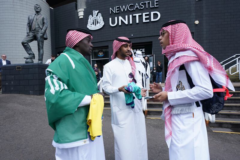 Football fans at St. James' Park on Sunday. Newcastle play their first game under new ownership after the club was bought out last week by Saudi Arabia's sovereign wealth fund. AP