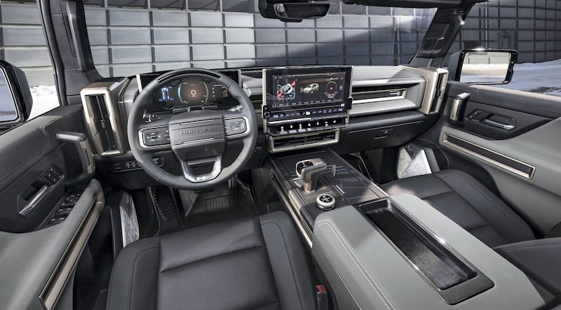 The GMC HUMMER EV SUV debuts in the low-contrast Lunar Shadow interior and includes a spacious cargo area and an architecturally inspired cabin.