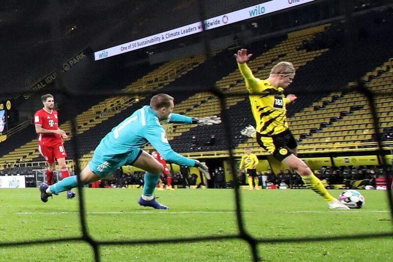 Dortmund's Erling Haaland scores a consolation goal to make it 3-2. EPA