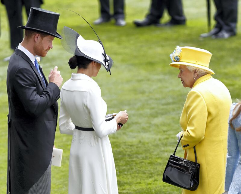 ASCOT, UNITED KINGDOM - JUNE 19: (EMBARGOED FOR PUBLICATION IN UK NEWSPAPERS UNTIL 24 HOURS AFTER CREATE DATE AND TIME) Prince Harry, Duke of Sussex, Meghan, Duchess of Sussex and Queen Elizabeth II attend day 1 of Royal Ascot at Ascot Racecourse on June 19, 2018 in Ascot, England. (Photo by Max Mumby/Indigo/Getty Images)