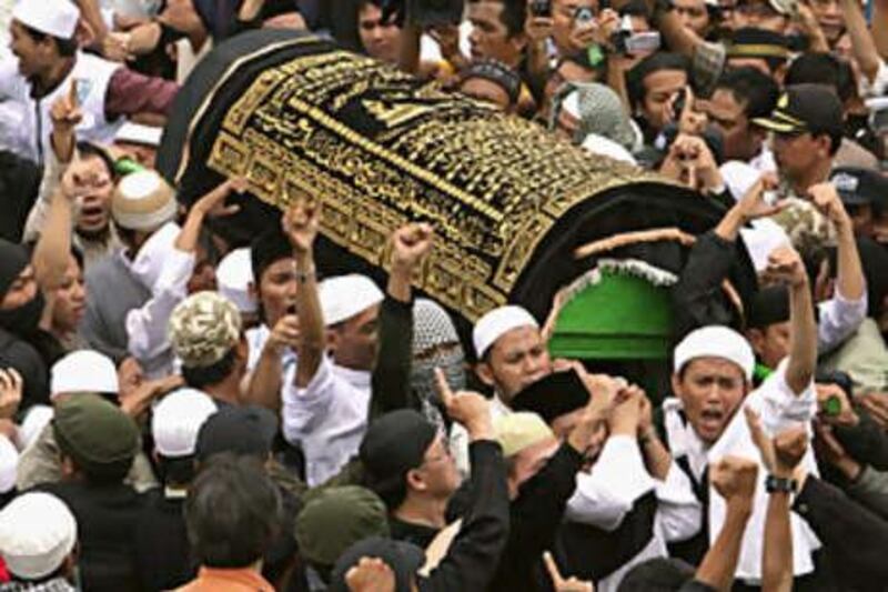The body of Bali bomber Imam Samudra arrives for a funeral in his hometown on Nov 9 2008, in Serang, Banten, Indonesia.