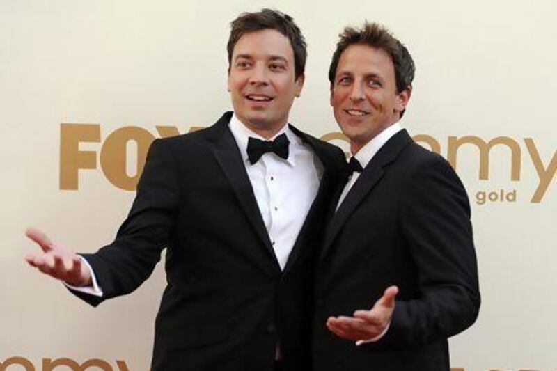 Jimmy Fallon, left, and Seth Meyers. AP