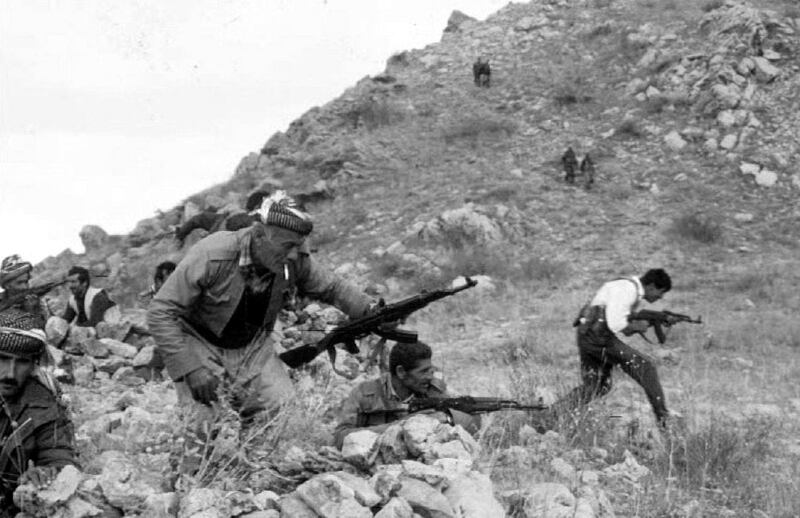 Peshmerga and Turkish soldiers prepare to storm a hill on October 23, 1992, near a stronghold held by the PKK in Hakurk Valley. AFP